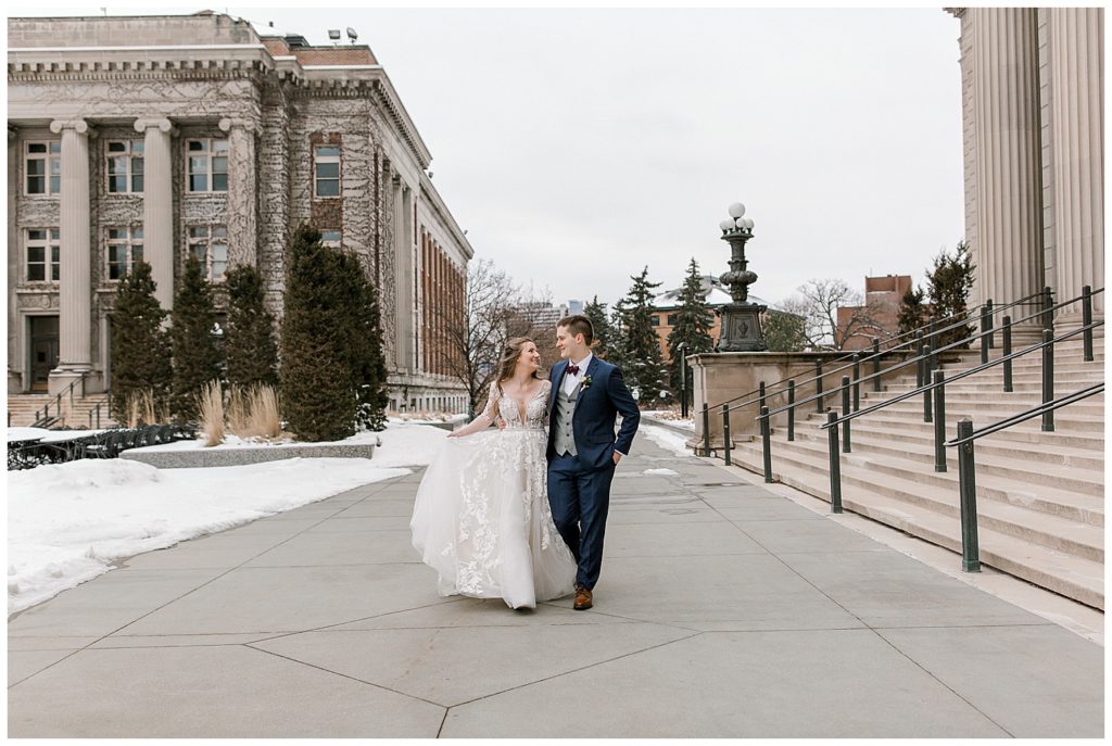 city wedding photos, University of Minnesota wedding, lace wedding dress, long sleeve wedding dress, blue suit, winter wedding inspiration