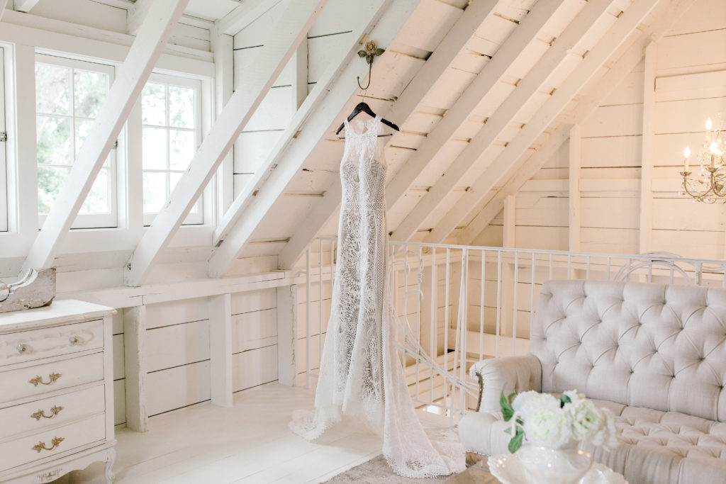 Bridal gown hanging up in bridal suite at Redeemed Farm.