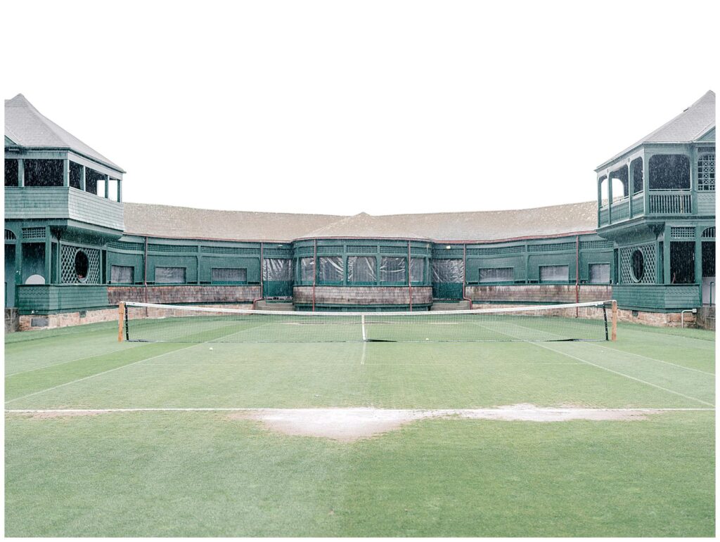 A rainy tennis court at International Tennis Hall of Fame 