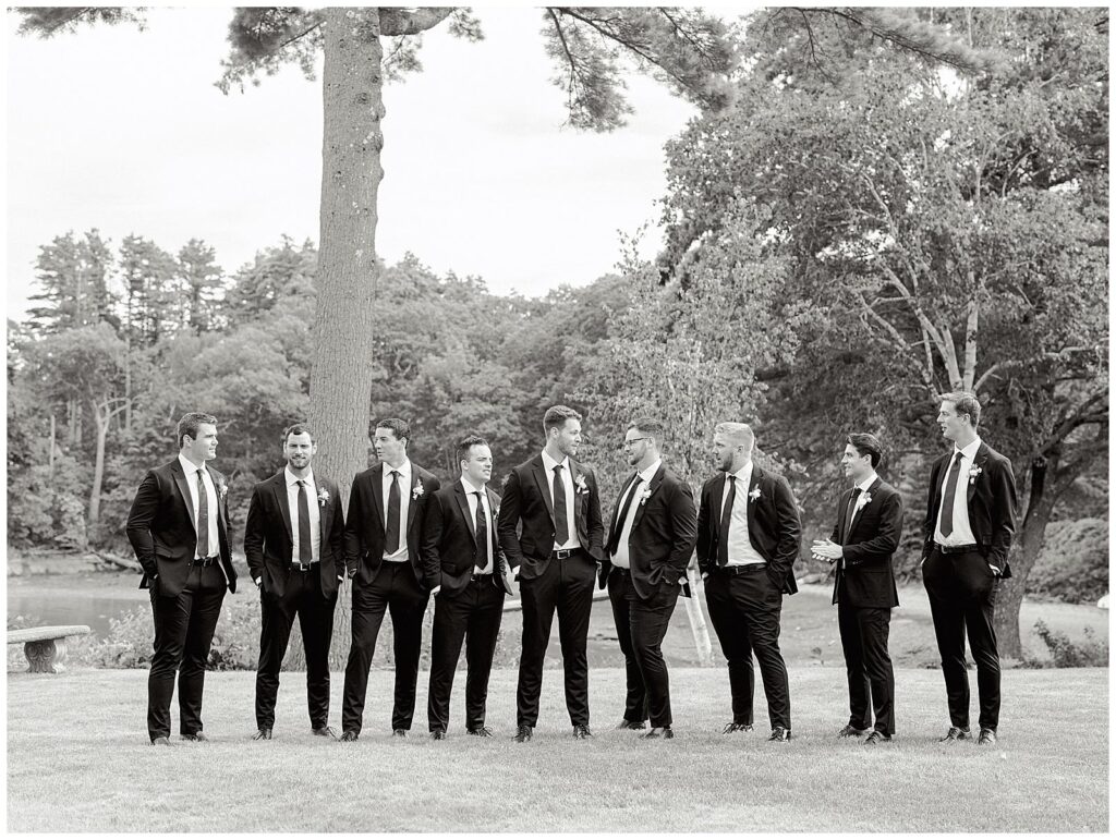 Groomsmen looking at each other
